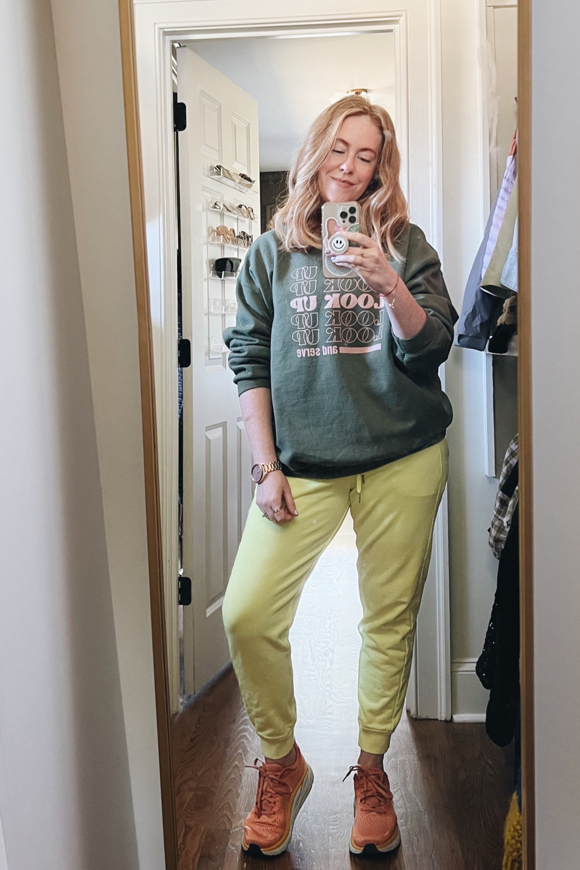 cozy work from home outfit. graphic sweatshirt size xl. neon joggers. hoka clifton 8. hoka shoes for women. garmin watch.

#LTKworkwear #LTKstyletip #LTKFind