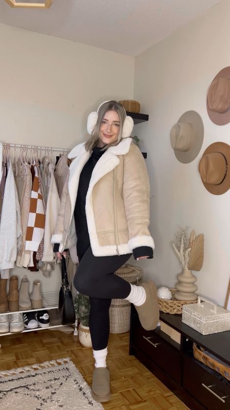 Midsize winter outfit - shearling aviator jacket (linked similar), black leggings, earmuffs, black turtleneck, ugg inspired platforms


#LTKmidsize #LTKSeasonal #LTKVideo