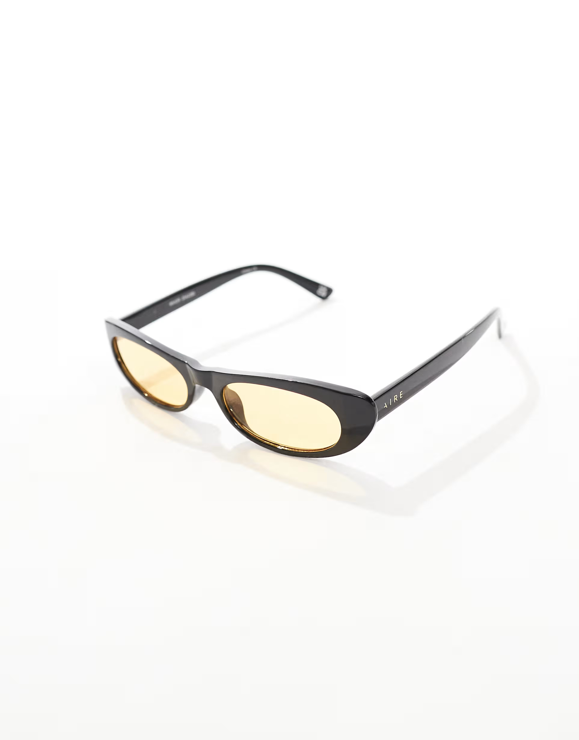 Aire Avior slim oval sunglasses in black with amber tint lens | ASOS (Global)