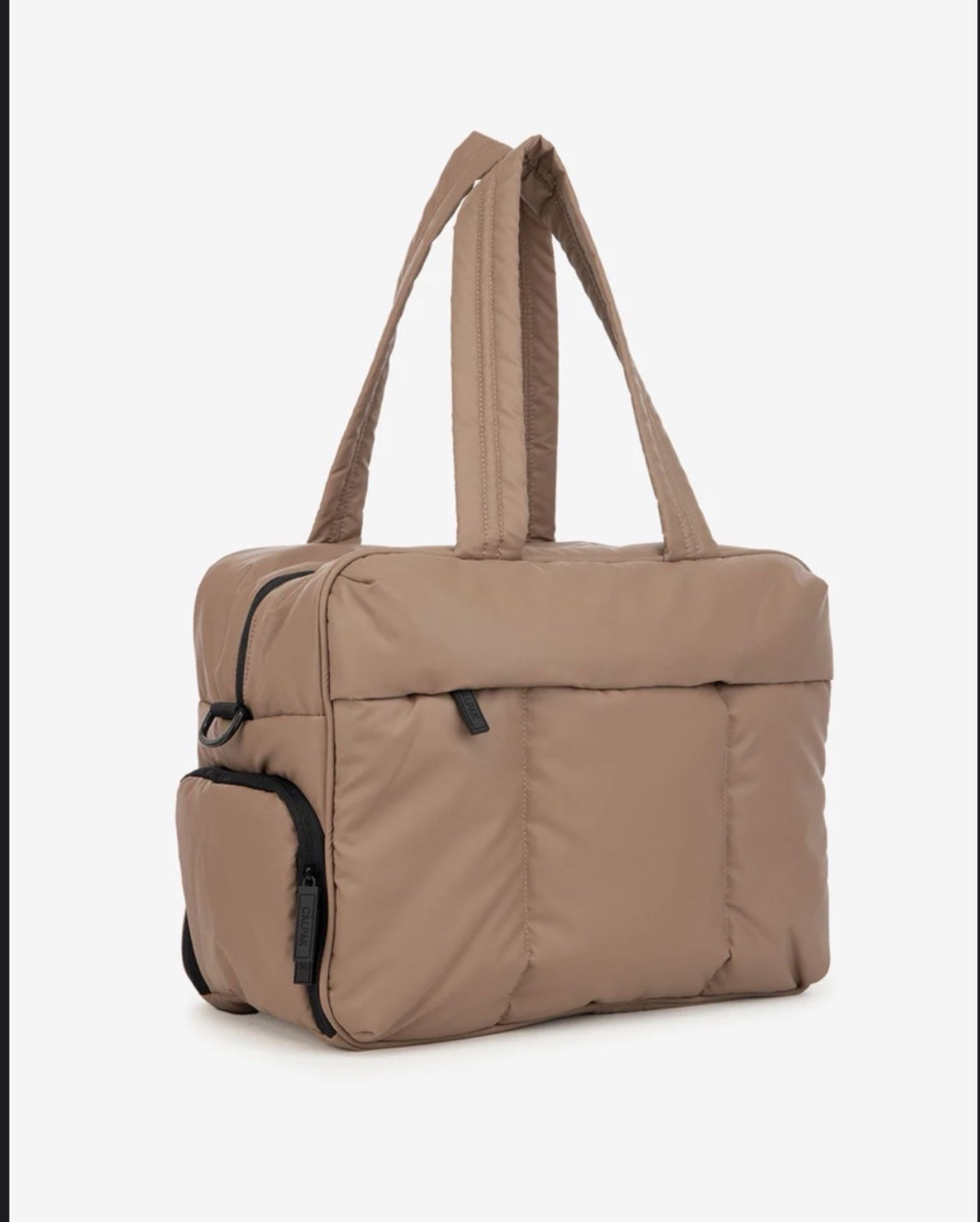 My absolute favorite bag to travel with kids with!! Slides under the seat easily and opens the long way so you can access everything!!