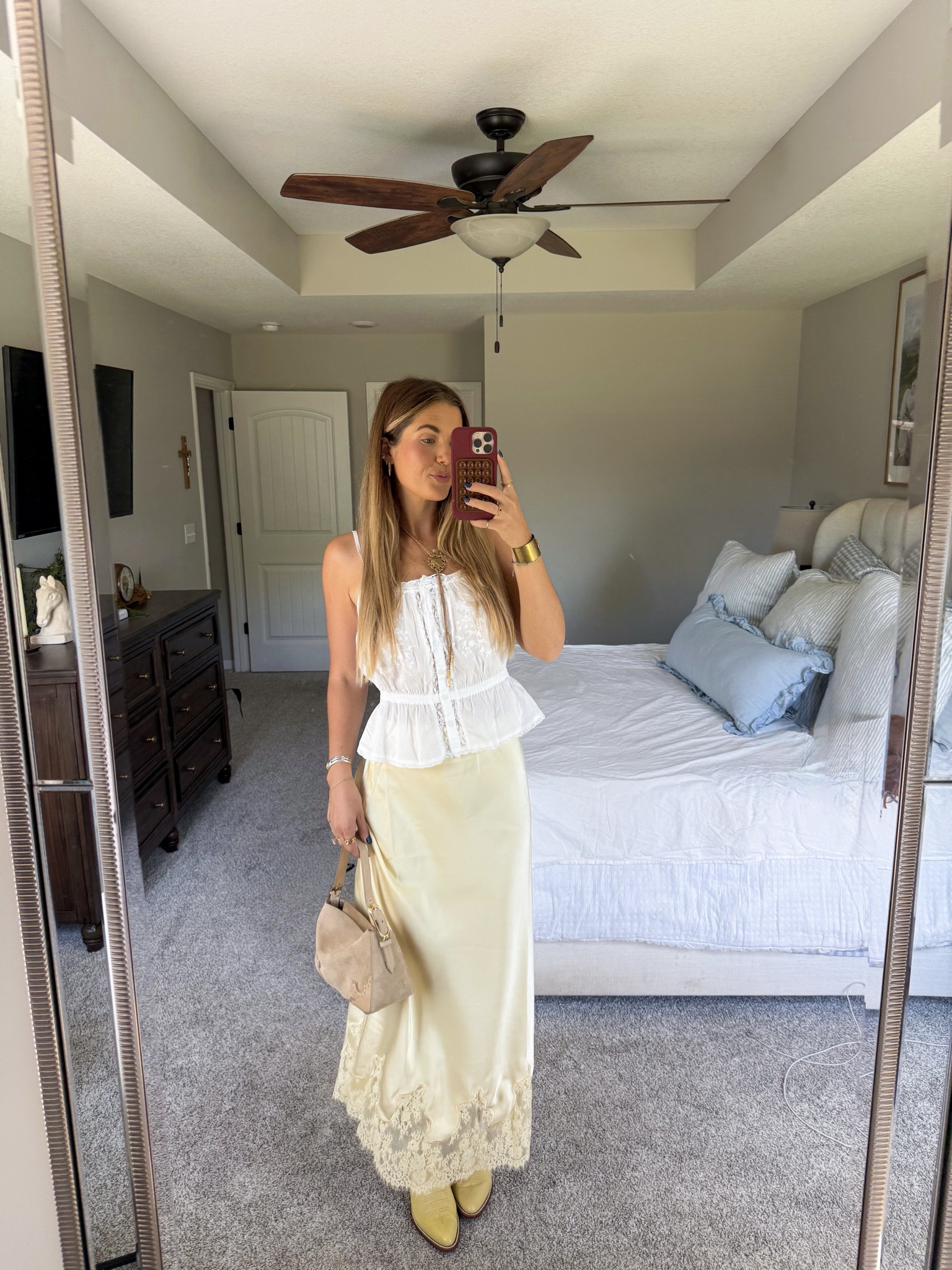 size small in tank top, my skirt sold out really fast sadly (from petal and pup) but i linked similar! cowboy boots are on my shopmy ✨ bolo tie is from november maker 

#LTKTall #LTKootd #LTKgrwm