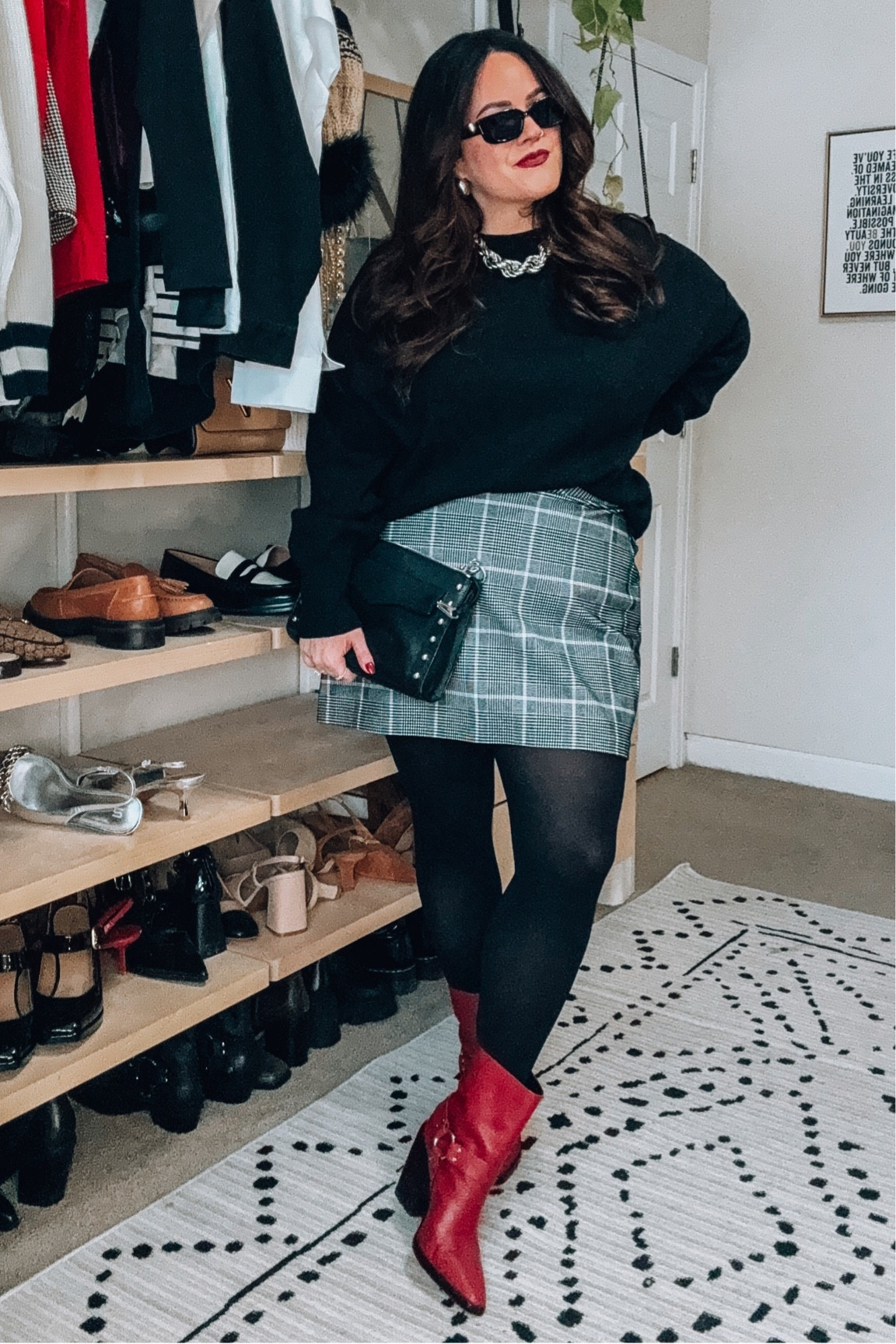 Midsize winter holiday outfit 
Amazon sweater xl 
Plaid skort- wearing a 1x don’t pant so snug on the tummy 
Smoothing tights (size c) 
Red moto boots tts 

#LTKmidsize #LTKSeasonal #LTKHoliday