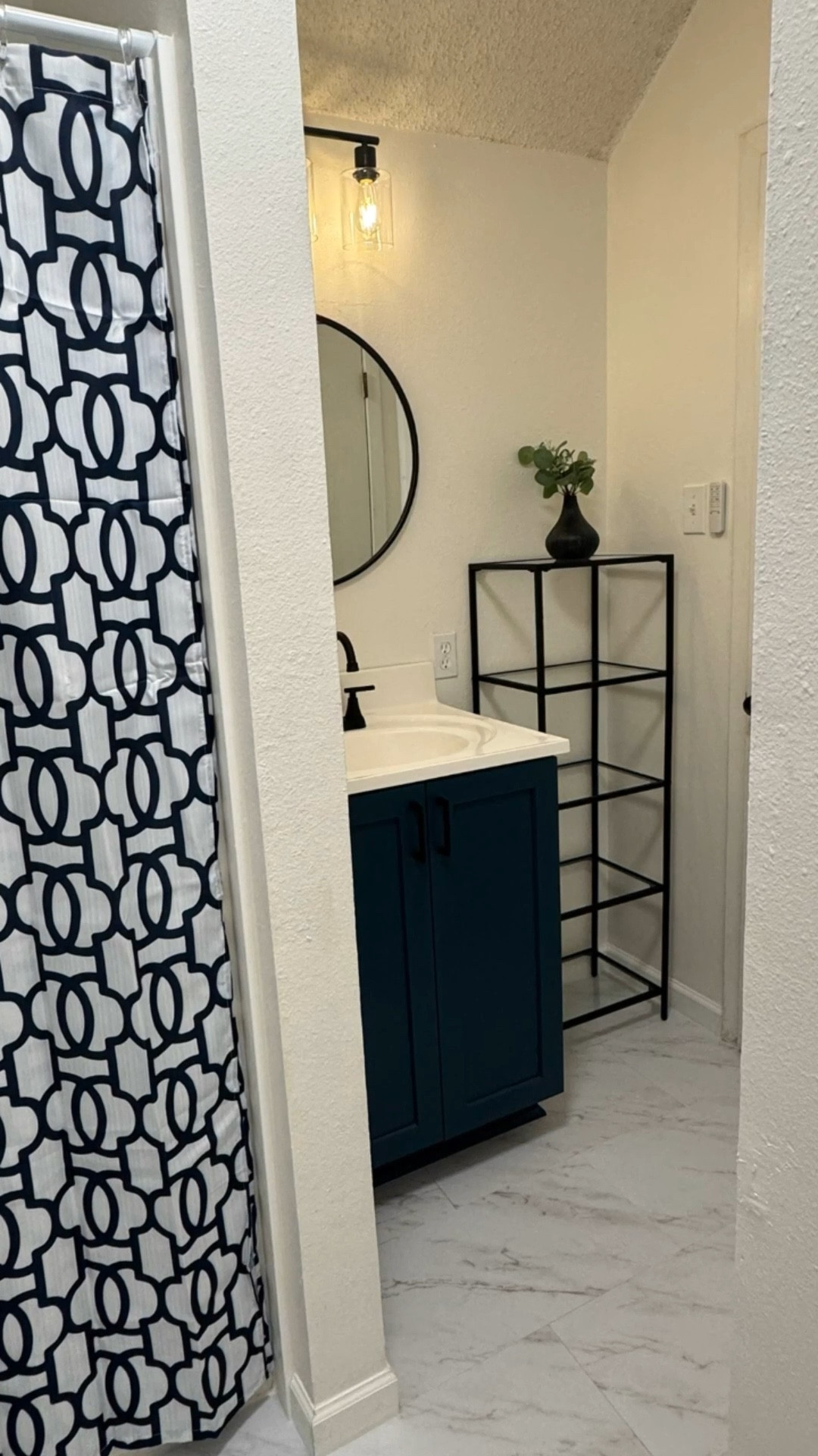 Bathroom renovation in my daughters condo is done. Her roommate moves in this weekend and so we had to get it finished.
We replaced the floors, replaced the vanity, changed the mirror and toilet, new baseboards, trim around the shower, pretty shower curtain and shelves. All in all this was another successtul Millet family renovation.
Follow our account if you want to see DIY renovations that are very affordable and cost effective.

#LTKOver40 #LTKStyleTip #LTKHome