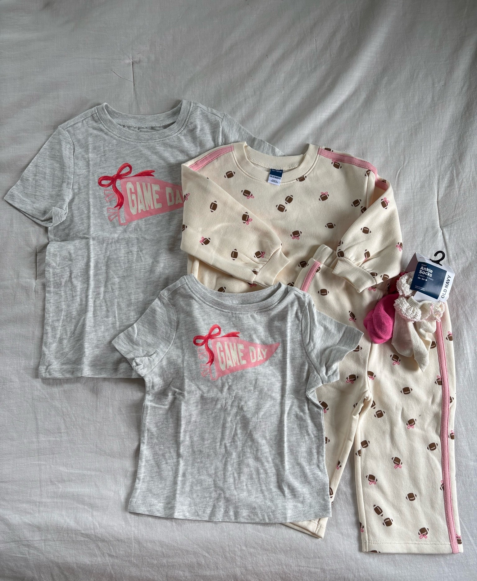 Football set - - BACK IN STOCK! 

Couldn’t pass up the most adorable game day gear. I love to match the girls, so it was they came in toddler 

and baby sizes.

#LTKSeasonal #LTKSaleAlert #LTKKids