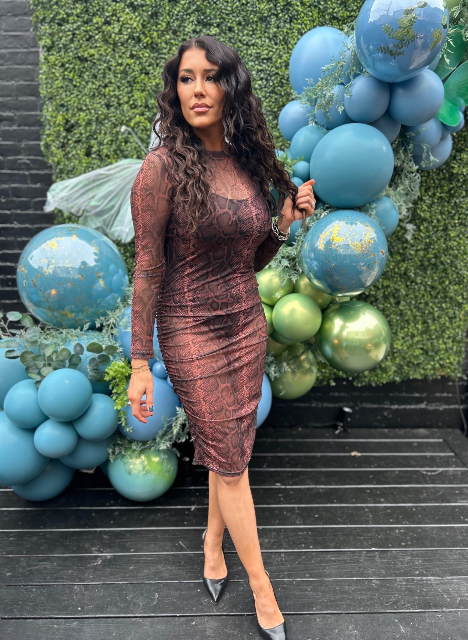 Shedding the winter layers for some snake skin. 🐍✨

The power of a good ruched midi! This snake print has just enough edge while staying in that gorgeous earthy color palette I love. Styling it with classic black pumps for a sleek look.

#LTKdayinmylife #LTKootd #LTKgrwm