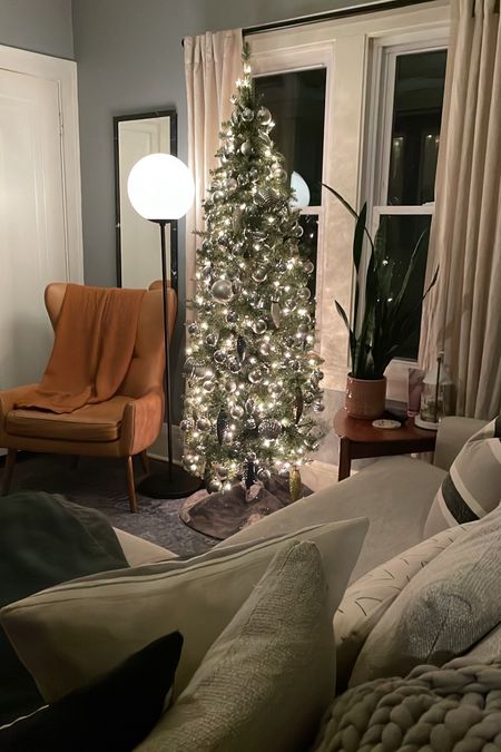Added a new Christmas tree to the house this year — and added some extra cozy to our TV-watching room!Chris

#LTKHoliday #LTKCyberWeek #LTKSeasonal