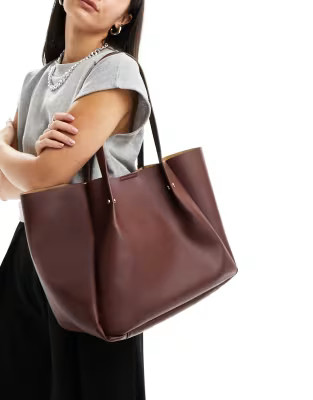 ASOS DESIGN wing stud detail tote bag in brown | ASOS (Global)