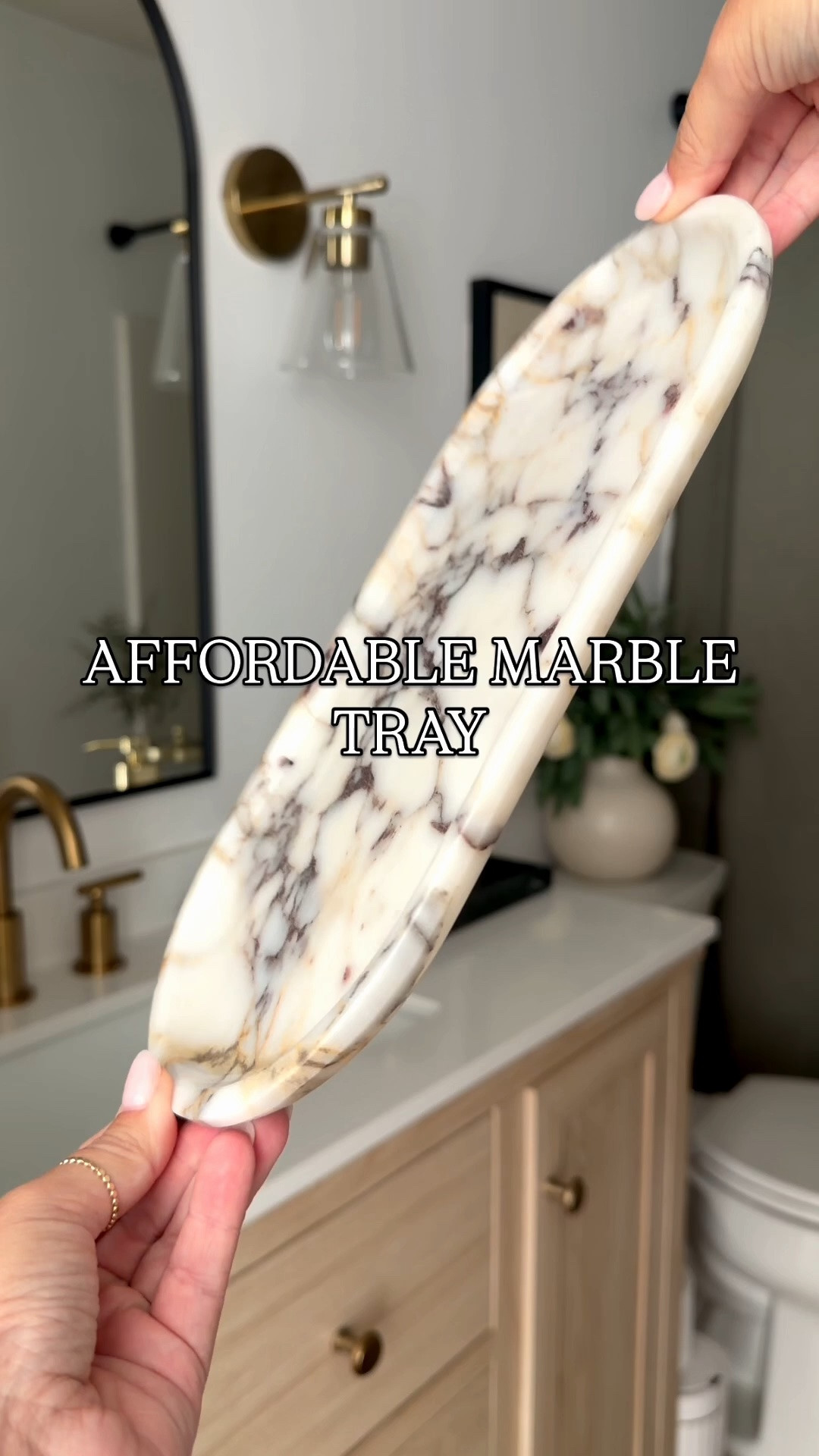 The prettiest marble tray for instantly making any space feel more elevated 🤍✨ Perfect for styling on a bathroom counter, kitchen, coffee table, or nightstand. Such a simple piece that gives that expensive, designer look!

#marbletray #homedecor #homefinds #neutralhome #bathroomdecor #kitchendecor #cozyhome #ltkhome

#LTKSeasonal #LTKHome #LTKSaleAlert