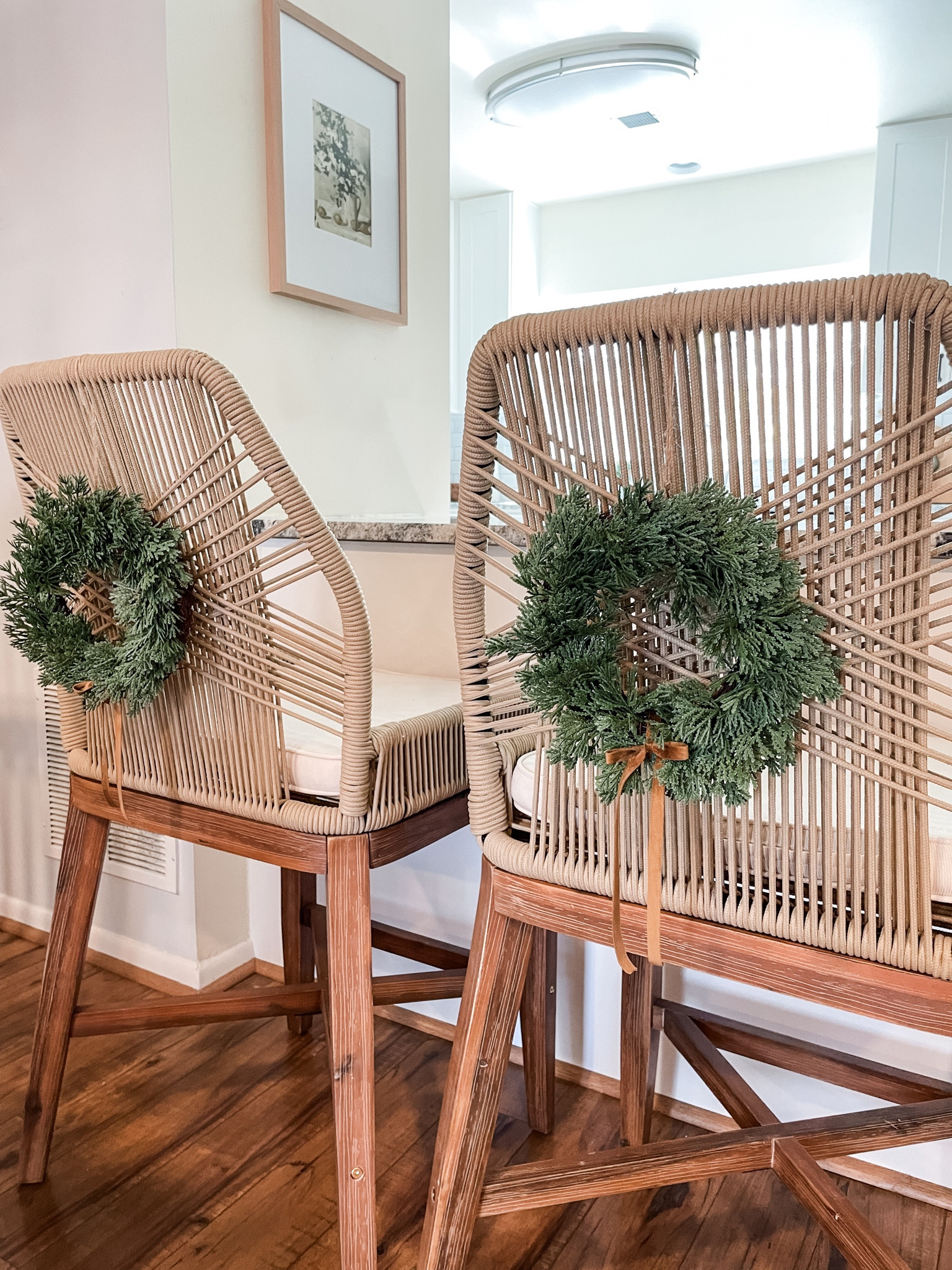 My FAVORITE rope crossweave counter stools with the cutest mini Christmas wreaths 

#LTKhome #LTKHoliday