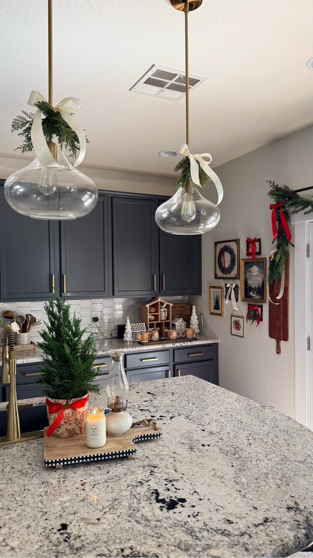 Christmas kitchen! Most of the frames are thrifted and so is the cool book stand so check those stores! 🙌🏼 

#LTKHoliday #LTKSeasonal #LTKHome