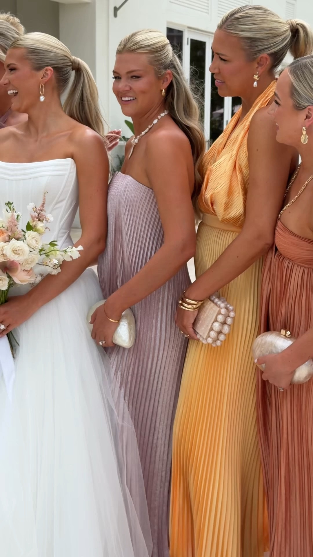 When I was planning my beach wedding in Naples, Florida, I knew I wanted to put a fun and modern twist on a few traditional details. 

Instead of flowers, my girls carried clutches, and it ended up being one of my favorite details from the entire day. The idea came about because our planner pointed out that my bridesmaids are all so fashionable and encouraged us to lean into that. Rather than covering up their looks with bouquets, she suggested giving them their own runway moment and letting their style shine. The clutches created a chic, elevated look for our beach ceremony while also feeling practical and memorable. Flowers are beautiful, but they're often one of the most expensive wedding details and are only used for a few hours. A clutch, on the other hand, is something my bridesmaids can continue to use long after the wedding day.

Another detail I loved was that each of the girls walked down the aisle on her own. It felt fresh, confident, and a little unexpected, which paired perfectly with the clutch idea. Together, those choices made the bridal party feel stylish, modern, and uniquely us.

A special thank you to our incredible planner, @jetsetwed, for encouraging us to do something different and helping bring this vision to life.

#LTKWedding