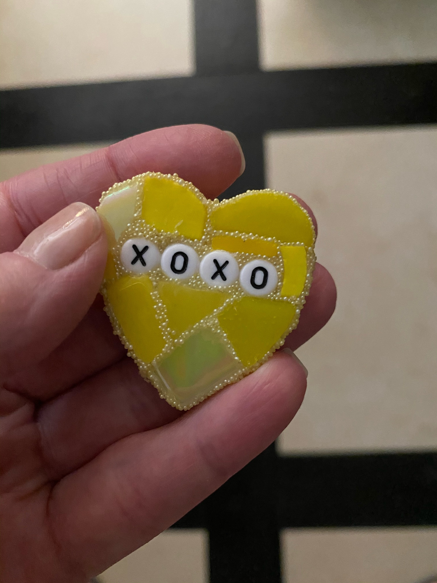 Sharing this XOXO mosaic heart in spring’s prettiest color. 💛 What’s better than a sweet saying with lots of hand-cut pieces of glass on a heart? 💛 Give this to your bestie, sister, Mom, or Grandparent — near or far! It’s the perfect size to display on a jewelry dish, catchall, or WFH desk. 💛 The heart is finished off with microbeads grout. For mosaic tips, tutorials, inspiration, and so much more please visit my YouTube channel: YouTube.com/julieweilbacher. Follow @julieweilbacher on Instagram for all things mosaic art. heart art - mosaics - glass heart - spring decor - yellow heart - xoxo - spring heart - mosaic heart - broken glass heart - decor object