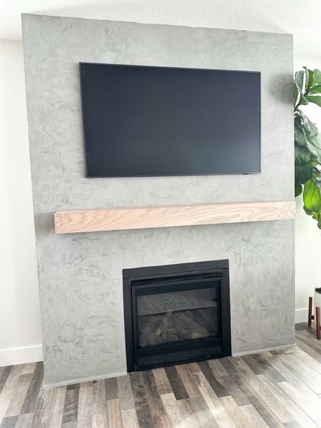 I love the way our DIY mantel turned out! It even has a hidden compartment for all the cords. I just demoed the tile surround and then put on Roman clay. I used red oak for the mantel. I linked some mantels you can buy if you don’t want to make your own! 

#homeproject #fireplace #livingroom #renovation #den 

#LTKhome #LTKfamily #LTKsalealert