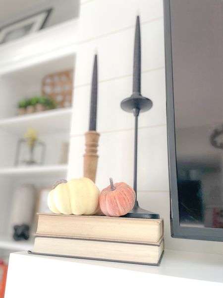 Vintage books make for great decor! I love to use them as a base. I’ve added a couple pumpkins and black glitter candles for Halloween. For fall I’ll just swap out the candles for simple green ones and I’m done!

#halloweendecor #halloween #fall #falldecor #fireplacedecor

#LTKSeasonal #LTKHalloween #LTKhome