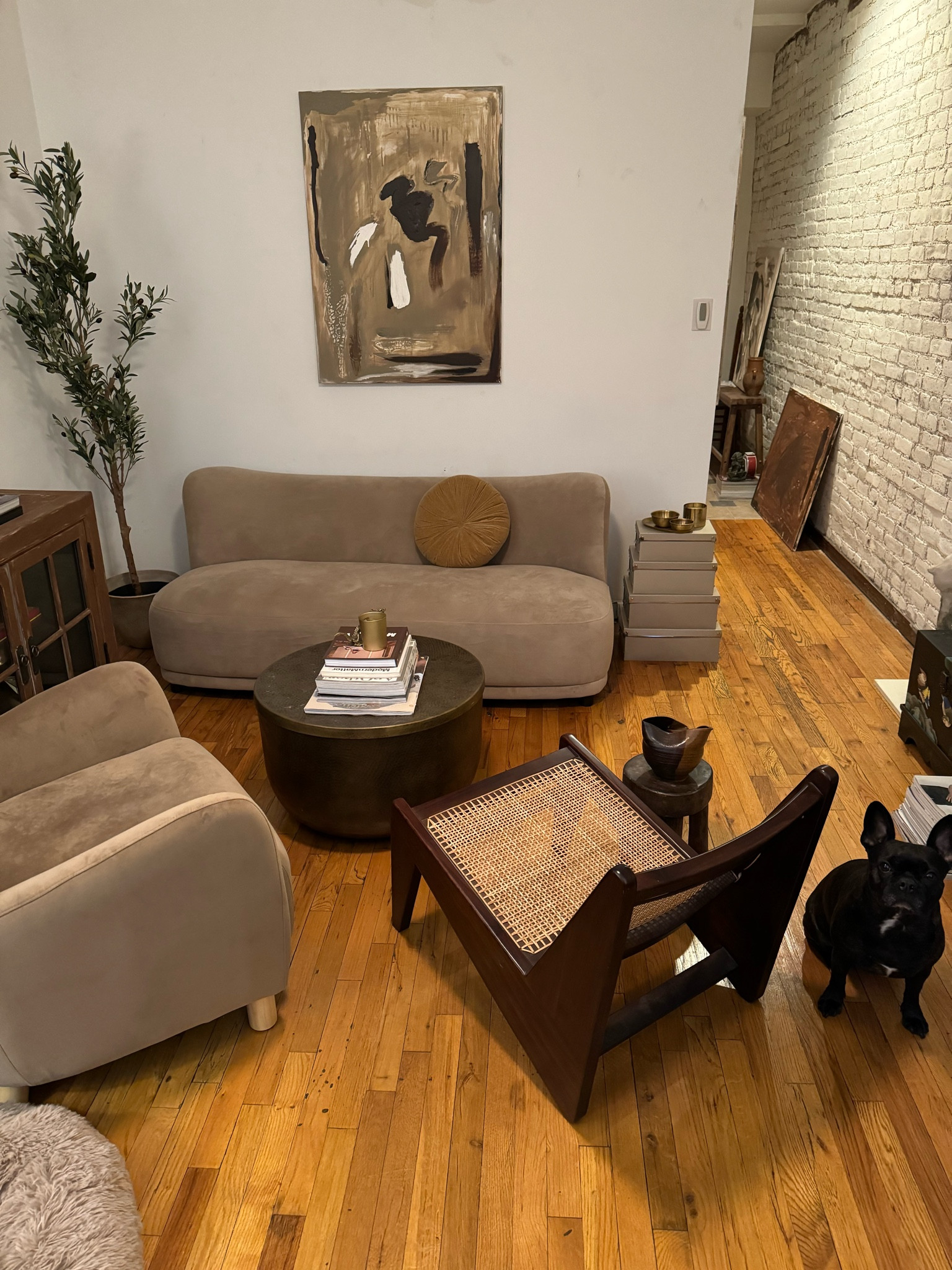 Finally happy with my new NYC living room!!! Axel Vervoordt meets Berber Lodge (IYKYK) 🤎 Had to share my newest couch I literally just had delivered!!! She’s small but mighty and so far I’m OBSESSED 😍 Browns as always, and debating on a final limewash color for the walls.  Oh and Matisse is pretty perfect as well 🖤🐶

#LTKhome