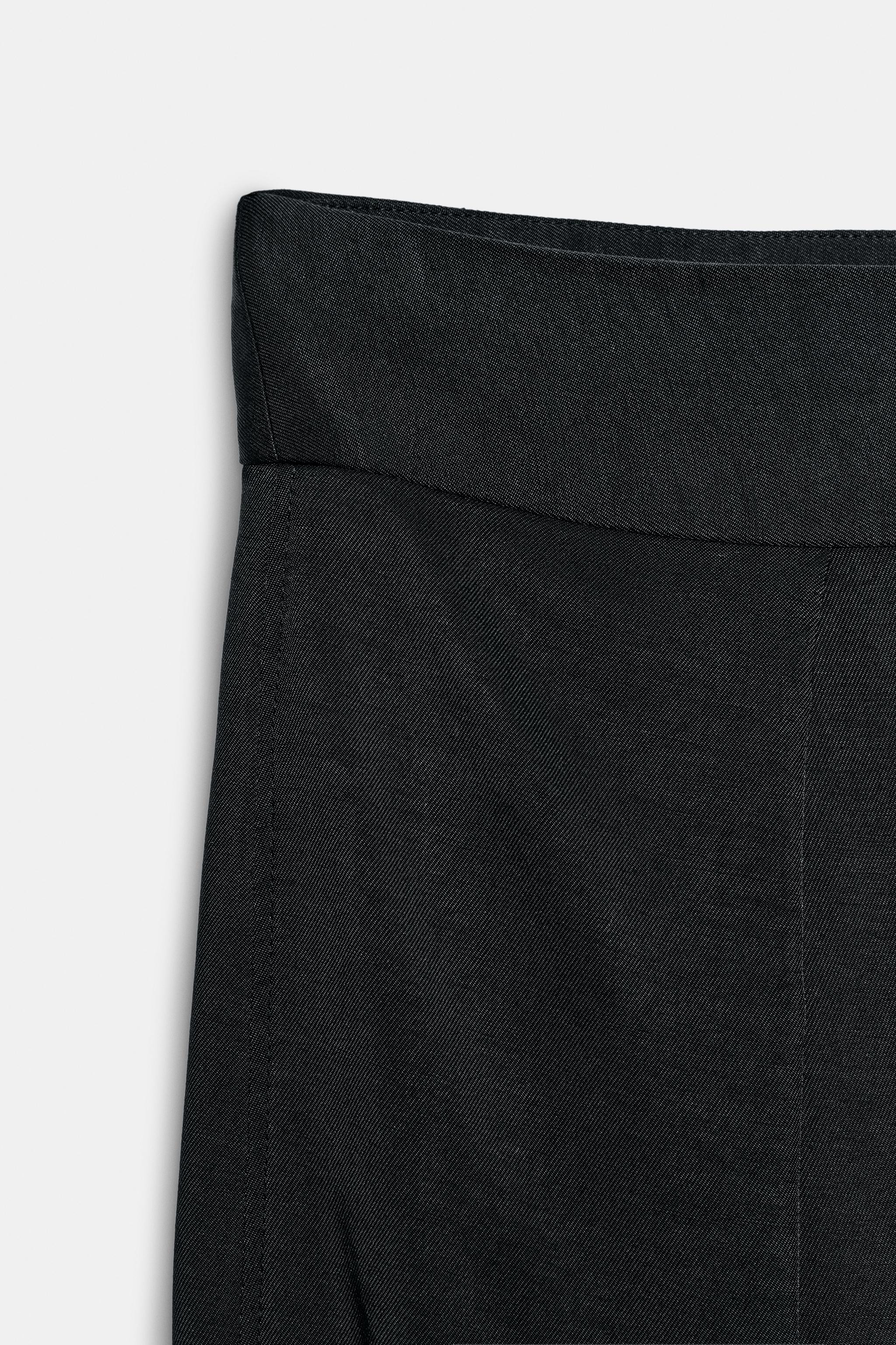 ZARA WOMAN COLLECTIONMid-waist trousers with main fabric made from viscose yarn. Featuring front ... | Zara UK