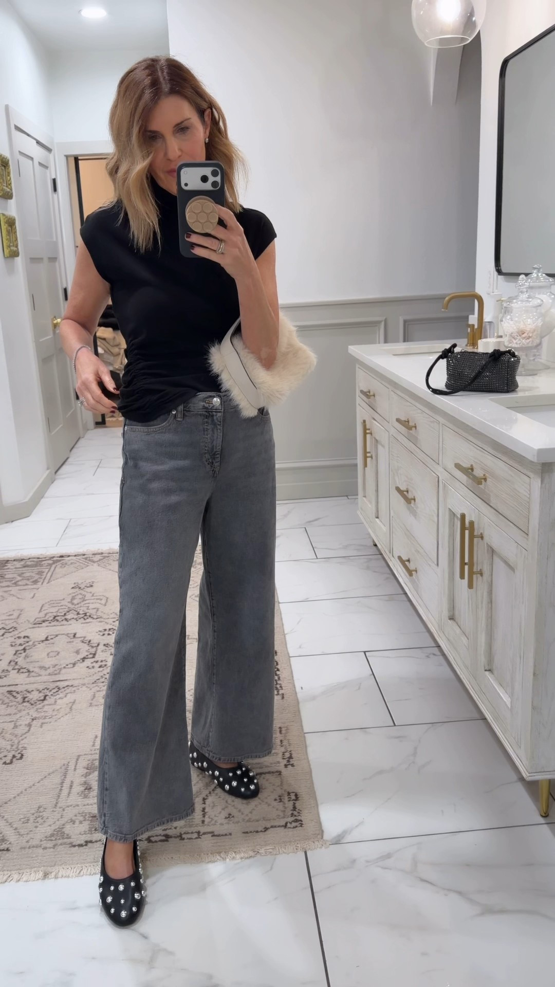 Wearing a small top and sized down in the jeans 

#LTKOver40