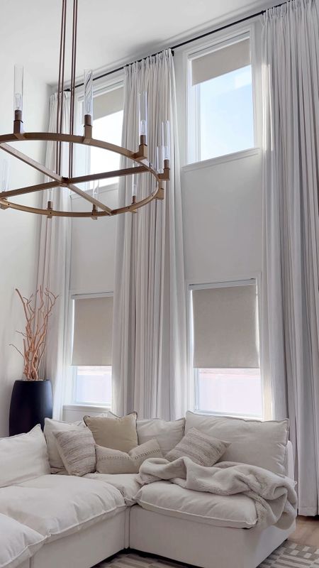 Living room curtains by 
TWO PAGES! 
Ordering details below ⬇️

Style: Liz polyester linen
Color: Beige white 
Header style: Triple pleated 
Liner type: room darkening 
Memory Shape: yes

Side panels width & length 
75in W x 215in L 

Middle panels width & length 
125in W X 215in L

#LTKhome