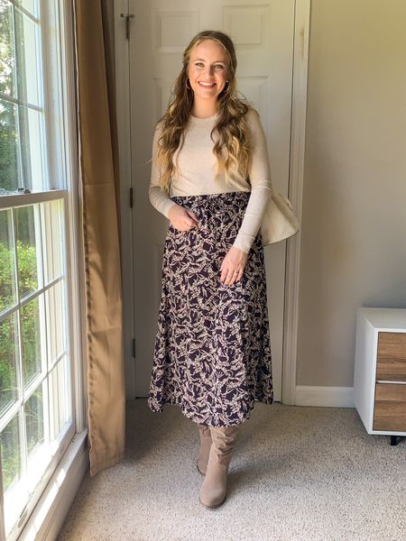 Midi skirt outfit idea! I’ve linked lots of similar items such as printed midi skirts, nude long sleeve tops, taupe boots, and a white bucket bag purse! More fall outfits on my page!

Church outfit idea! Work outfit idea! Date night outfit idea! 

#LTKworkwear #LTKshoecrush #LTKitbag