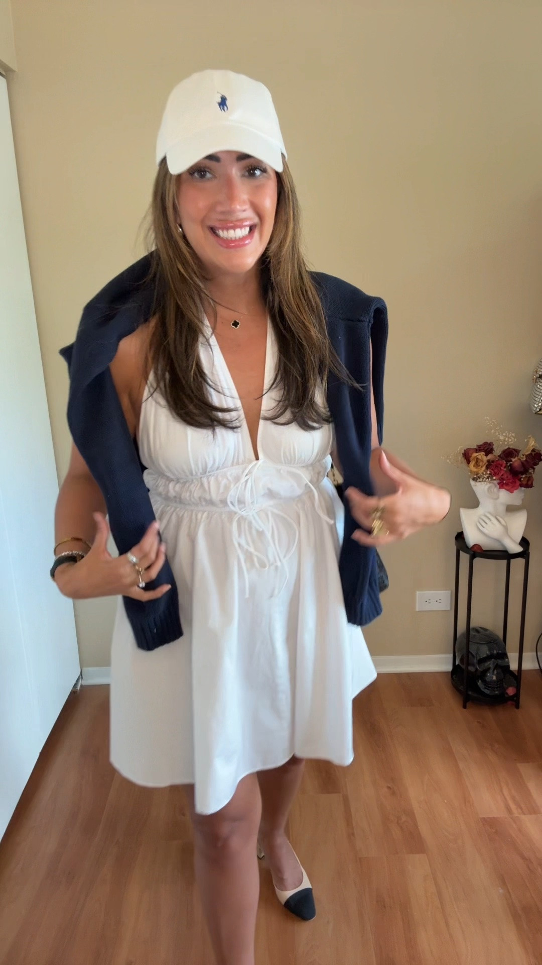 Serving courtside prep with a little Paige Lorenze inspiration. 🎾

I styled this white dress with a Polo cap, Celine sunglasses, delicate jewelry, and my navy Ralph Lauren flag sweater draped over my shoulders for that polished, all-American tennis-club look.

📍 Shriners Children’s APP Pro Invitational

Would you wear sneakers, ballet flats, or sandals with this?

#TennisStyle #CourtsideFashion #RalphLaurenStyle #SummerOutfit #SportyChic