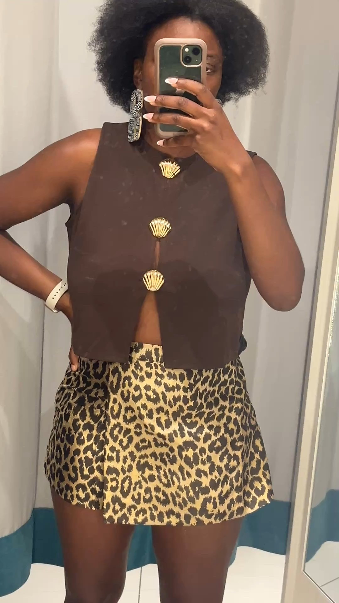 Gold buttoned brown vest with super cute leopard mini skirt 

#LTKFindsUnder100 #LTKSeasonal #LTKMidsize