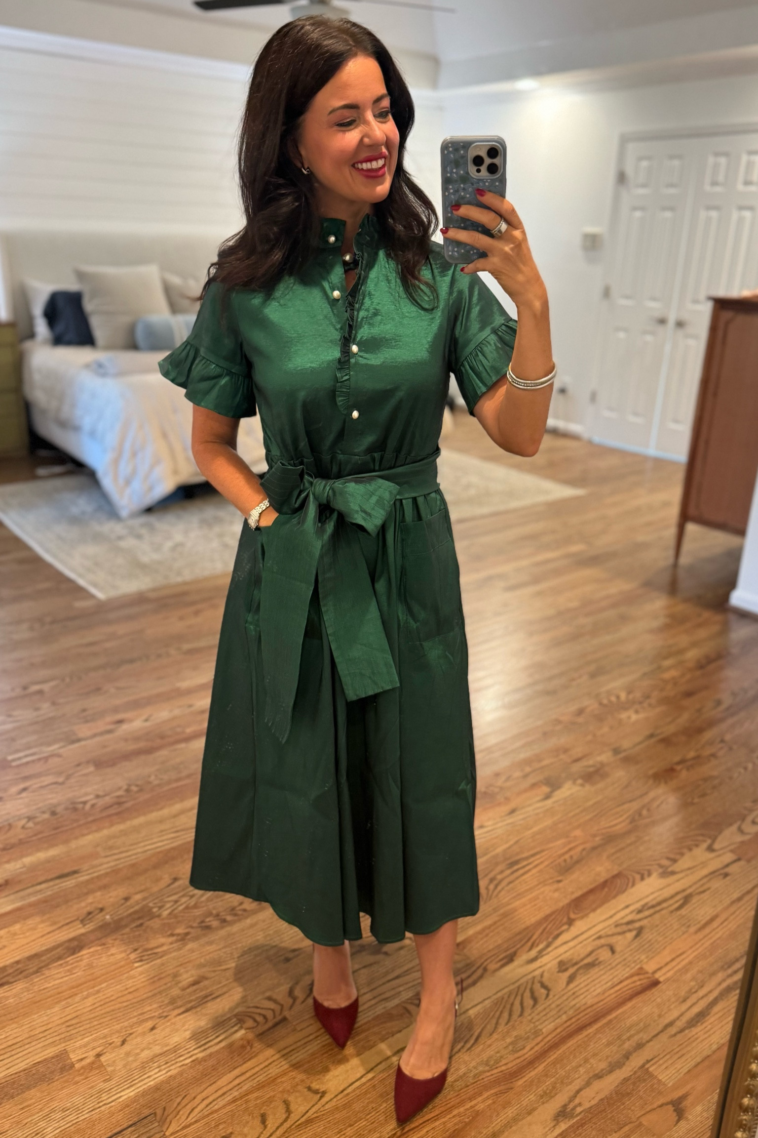 The prettiest holiday dress. Such great feminine details  Runs generous. I’m in a size small. And loving the shoes here. 

Normal sizing: small on top, medium on bottom. 