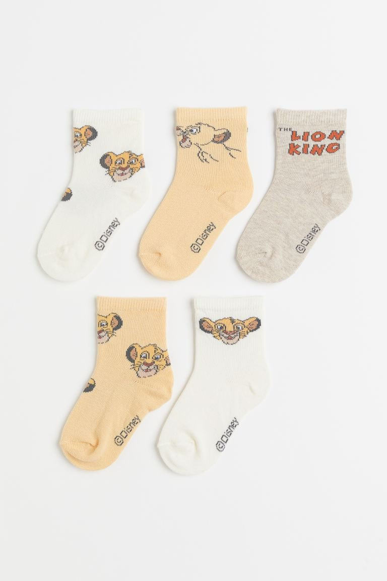 Fine-knit socks in a soft cotton blend with elasticized tops. | H&M (US + CA)