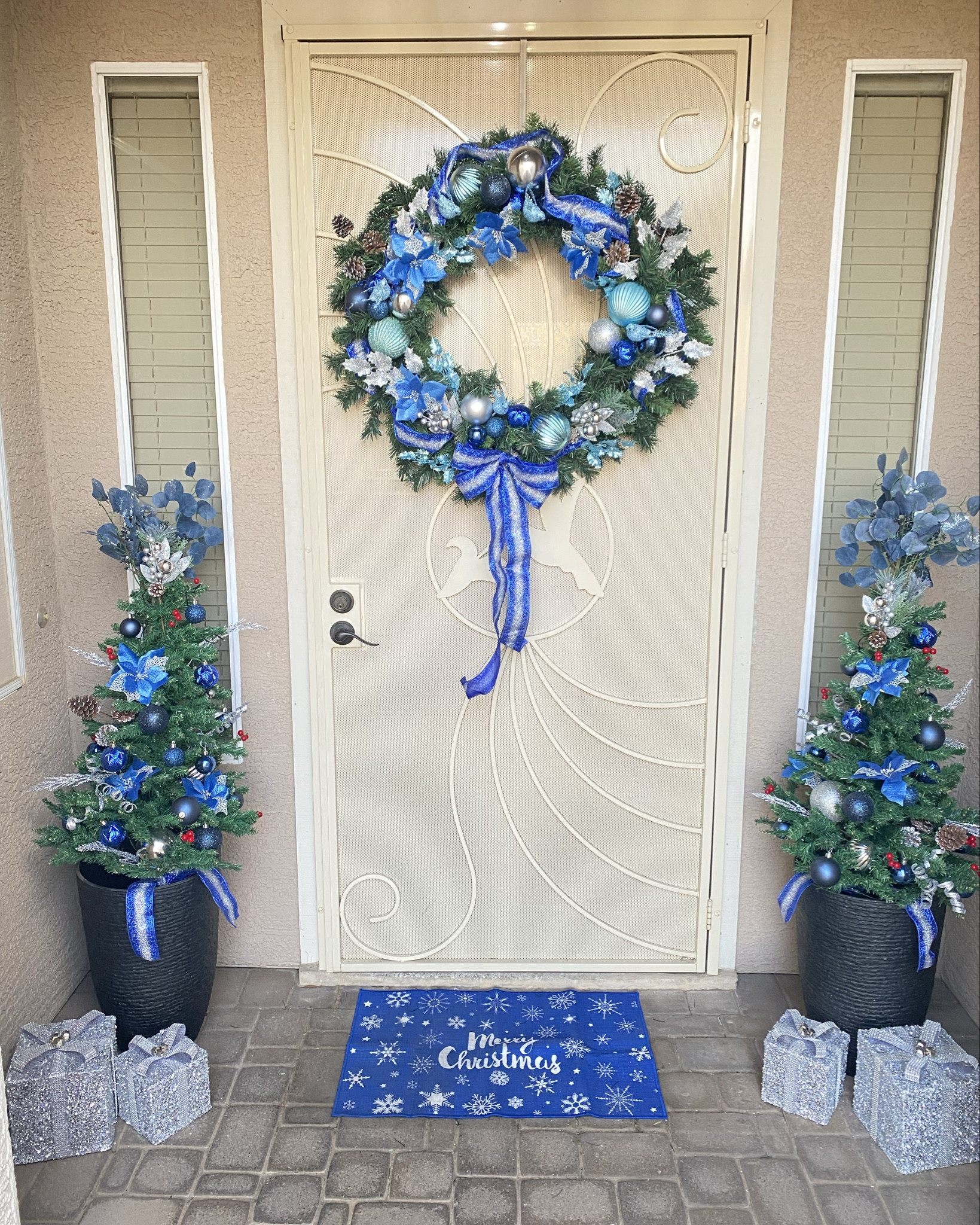 Holiday front porch decorations! 
I forgot to post this sooner but wanted to make sure and share so you can save ideas for next Christmas 🎄💙🩵 or shop the clearance and sale items now!

#frontporchdecor #blueandsilver #bluechristmas #christmasdecor #holidayfrontporchdecor #howtodecorateporch #styleforless #christmaswreath

#LTKSeasonal #LTKHoliday #LTKFindsUnder50