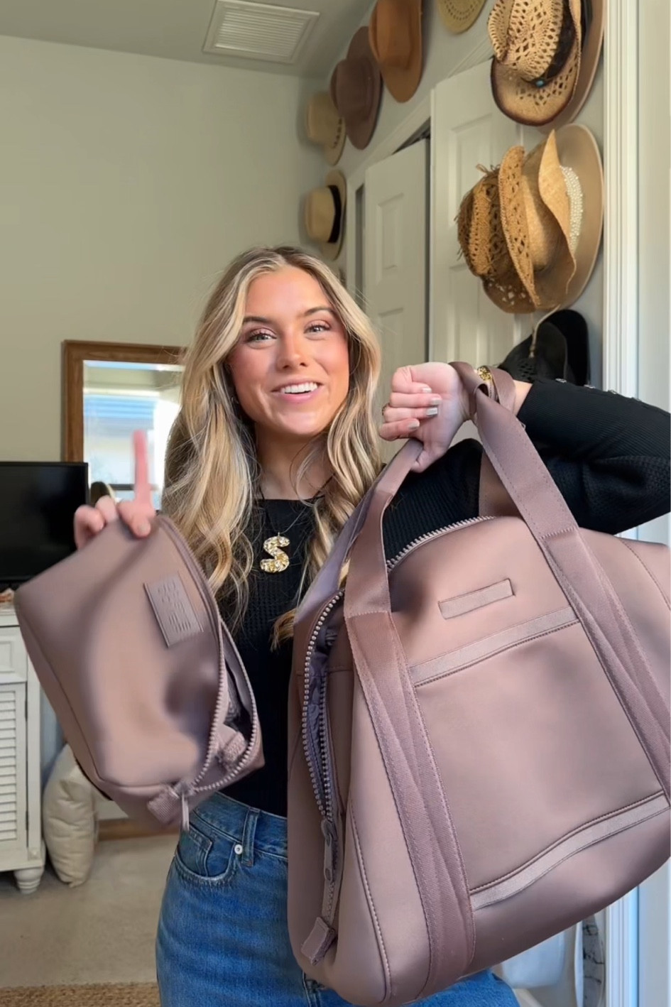 Wearing Madewell high rise wide leg jeans and black bodycon long sleeve tee with my Hannah B jewelry statement initials necklace. an over packers best friend is a good travel bag and organizers, speaking from experience of course 😉 adding to my @dagnedover collection with the Landon Duffle in large color dune along with the Hunter Toiletry bag in large color dune. 

#dagnedover #travelbags #accessories #dagnedoverpartner #backpack #travelaccessories #baglover #bagstyle

#LTKHoliday #LTKSeasonal #LTKItBag