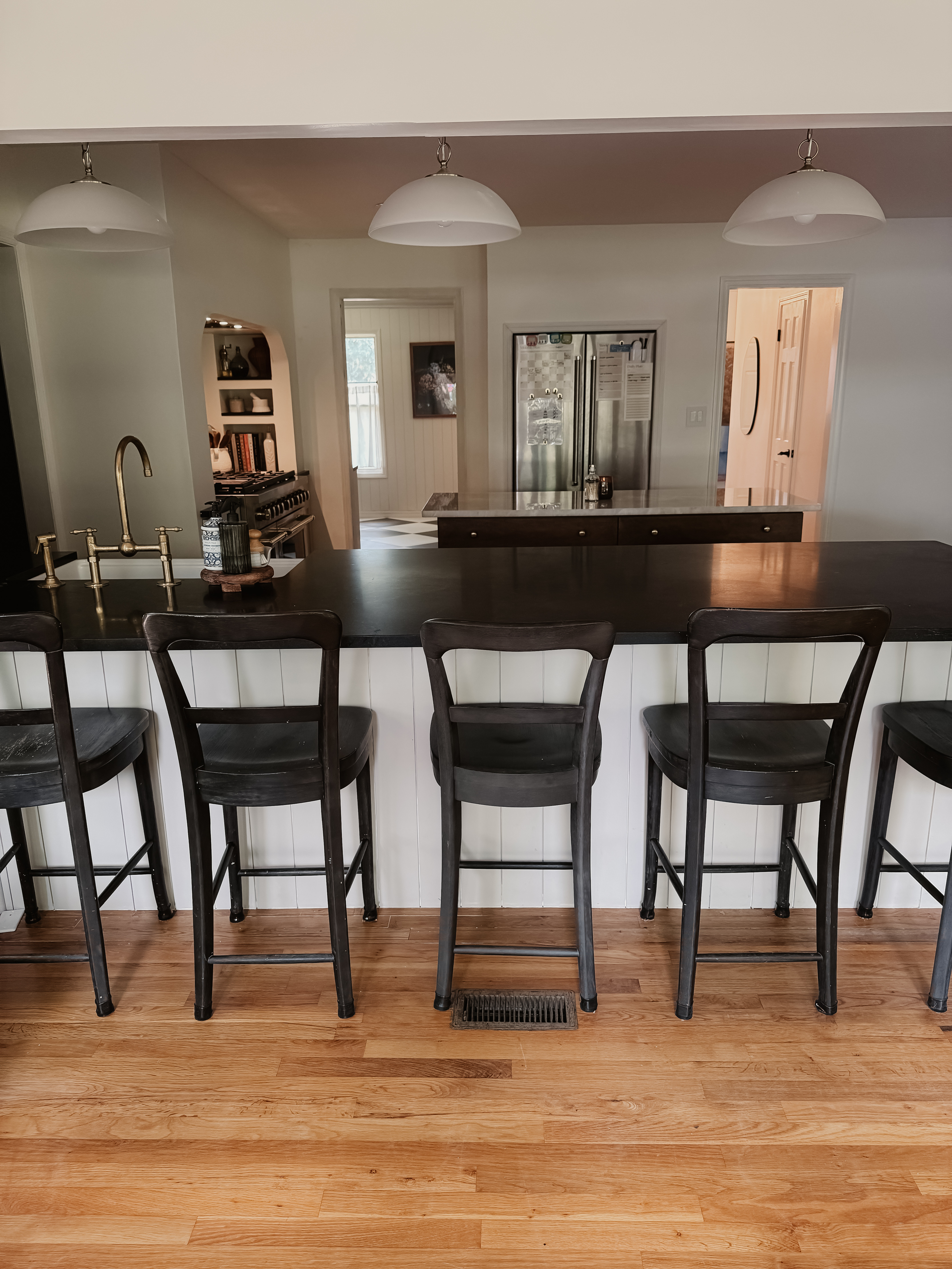 Kitchen bar stools
Pendant lights
Unlacquered brass faucet 

 

#LTKHome