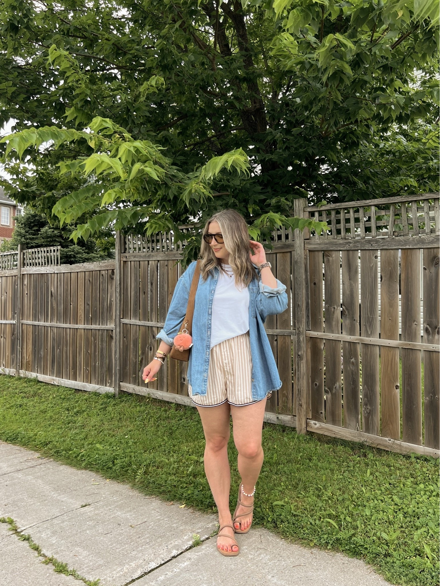 Comfy summer outfit! Wearing my usual size L in the denim shirt and striped shorts. Linked similar white tee. I’m a 9.5-10 shoe and wear a 10 in the Crocs sandals. Canadian Old Navy and Crocs links are under “similar products”

#LTKsummer #LTKmidsize #LTKsale