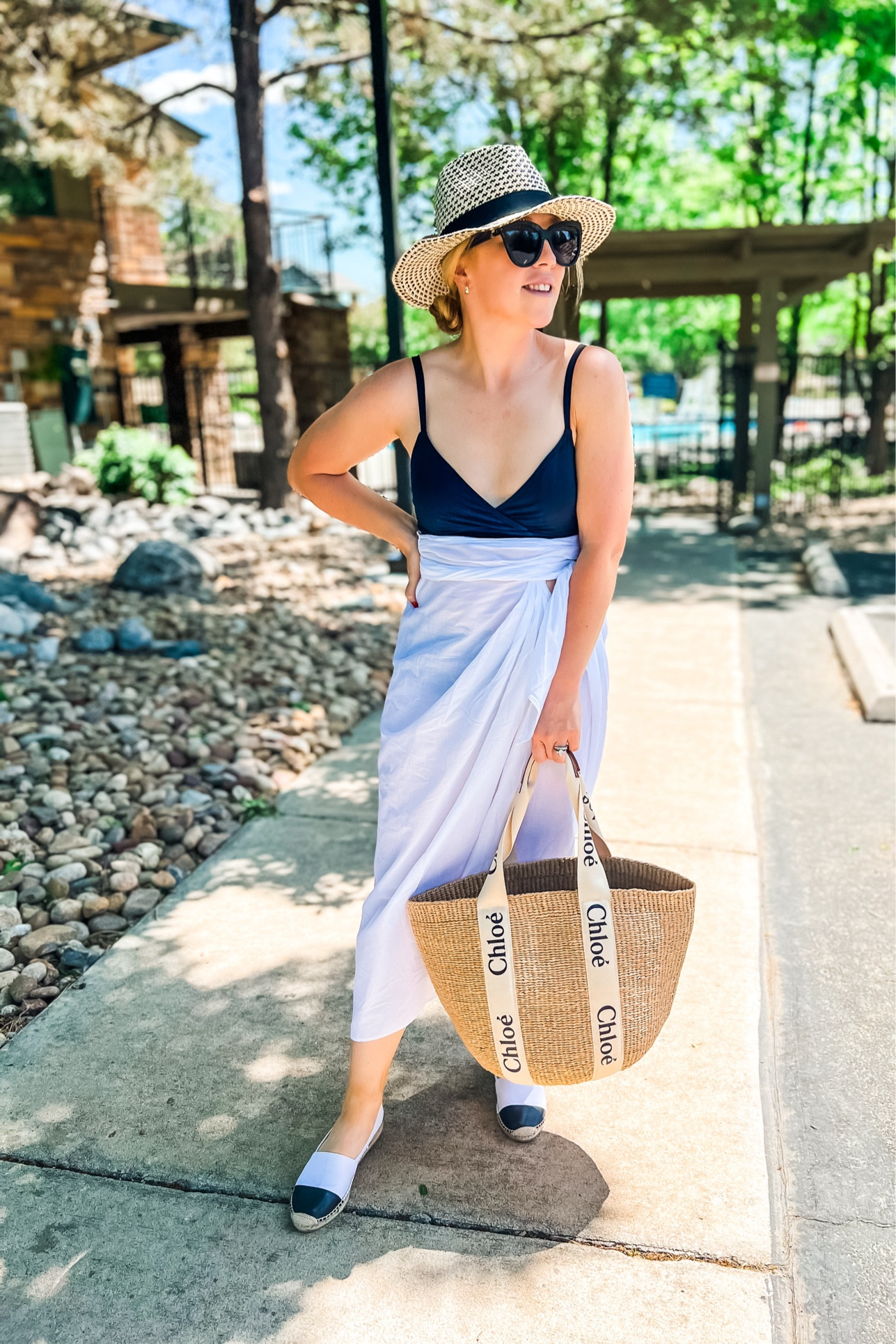 Pool outfit! Linking similar black bikini options and sarongs. Exact espadrilles and tote bag.

Pool outfit. Beach outfit. Swimsuit. Swimwear. Beach day. Vacation outfit. Resort wear. Black swimsuit. Swim cover up. Sarong. Cover up skirt. 

#LTKSwim