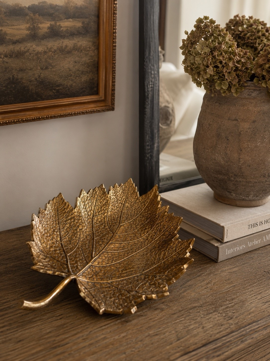 The Prettiest Little Fall Detail

This antique-inspired leaf tray adds the perfect touch of warmth for fall without making a space feel overly seasonal. The aged brass finish and beautiful leaf detailing give it that collected, designer look that works styled on a console, coffee table, kitchen counter, or entryway. At 13” long, it’s such an easy statement piece for layering into your fall decor.

Follow @farmtotablecreations on Instagram for more home finds and styling inspiration.

#FallDecor #FallHomeDecor #AutumnDecor #NeutralFallDecor #SeasonalDecor #HomeDecor #DesignerInspired #ModernOrganic #CozyHome #EntrywayDecor #ConsoleTableStyling #FallHome

#LTKHome #LTKSeasonal