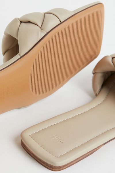 Slides in faux leather with a wide, braided foot strap and open, square toes. Faux leather lining... | H&M (US + CA)