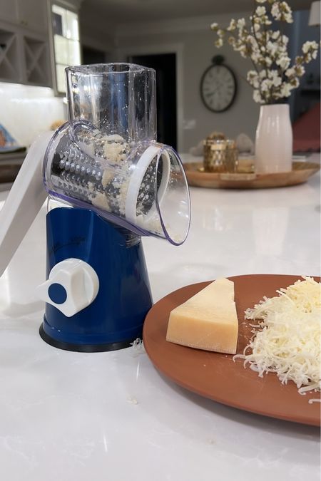Cheese grater / takes one minute to grate a whole block / 30% off