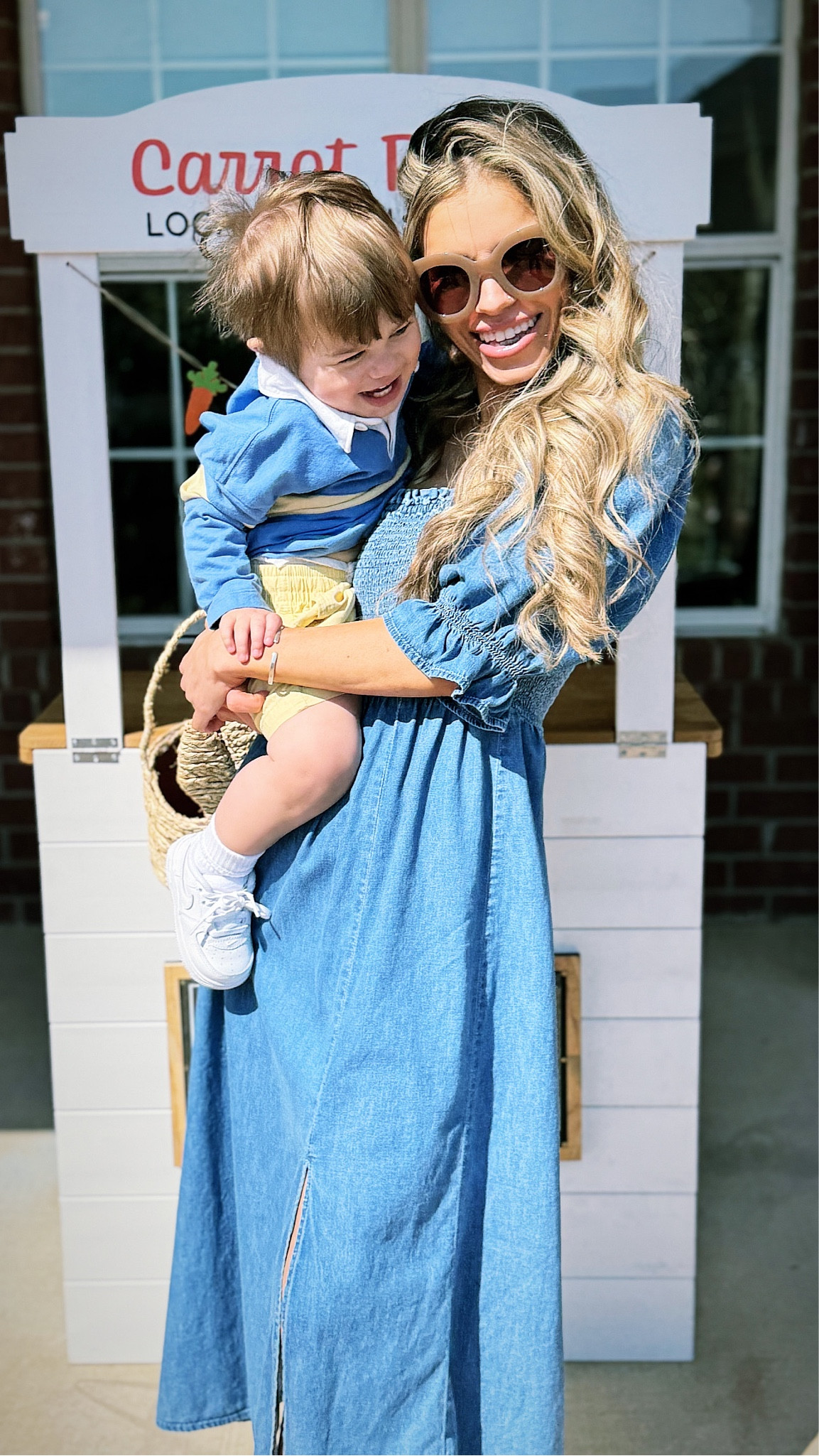 Mommy & me spring easter outfits. Im wearing a puff sleeve denim sundress from gap and sunnies from prive riveaux. P is wearing a blue and yellow colorblock polo and matching yellow shorts from gap factory with kids white airforce ones from kids foot locker.

#LTKkids #LTKSeasonal #LTKfamily