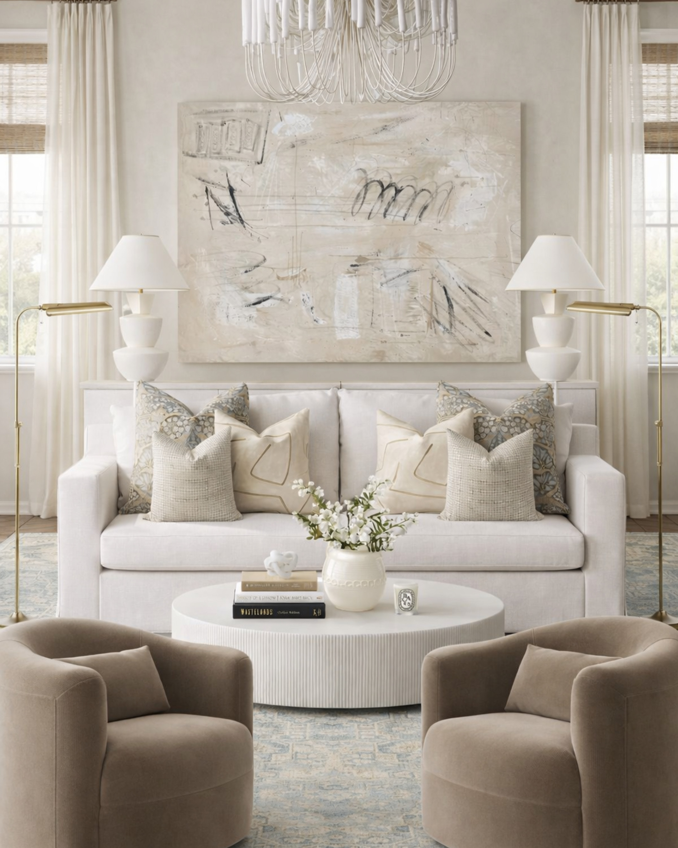 Soft neutrals, but make it layered 🤍 This is one of those spaces that proves a neutral palette doesn’t have to feel flat—it’s all about mixing textures, subtle pattern, and warm tones to create depth. The sculptural chandelier, tailored upholstery, and soft blue rug keep it feeling elevated but still livable. Saving this as my blueprint for a calm, polished living room. 

 #LTKHome