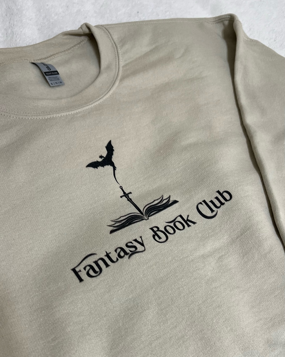 Squealing bc my Fantasy Book Club sweatshirt came in today!! The perfect fall wardrobe staple for all my fantasy/romantasy girlies out there 🧚🏻🐉🏰🗡️ 

#LTKFindsUnder50