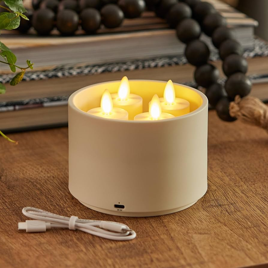 Luminara Set of 4 Rechargeable Moving Flame LED Flameless Tealight (1.5" x 2.1") with Charging Ba... | Amazon (US)