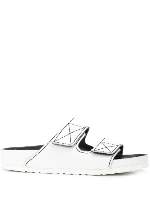 x Birkenstock Arizona slides | Farfetch (UK)