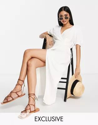 The Frolic Exclusive beach wrap dress in white | ASOS (Global)