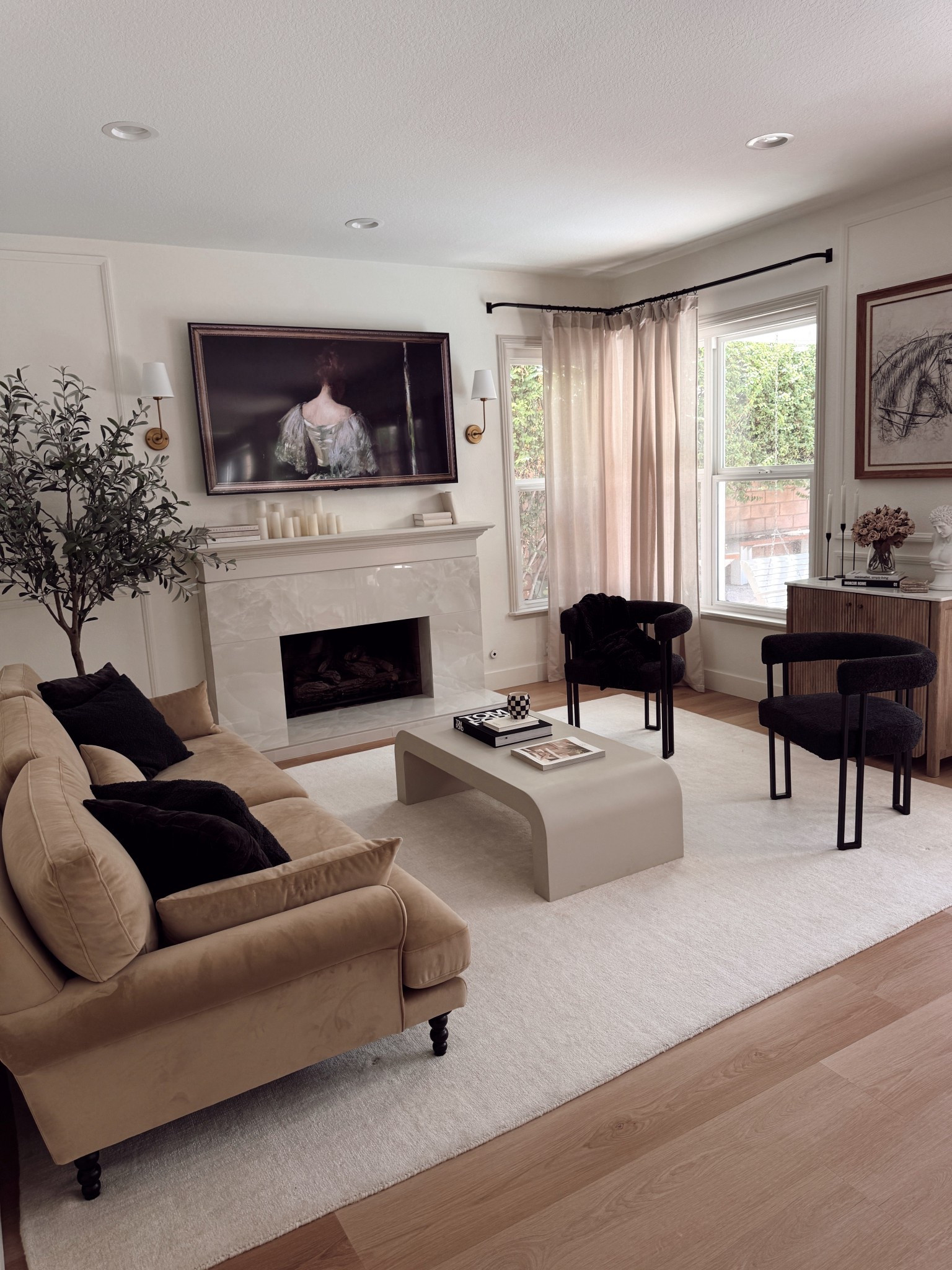 Living room • den • neutral home decor • Wayfair finds • black chairs • brown camel sofa • velvet sofa • wall art • sconces 

#LTKHome