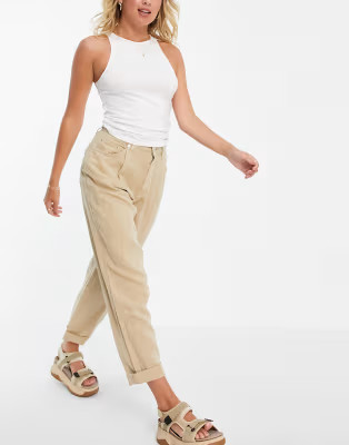 ASOS DESIGN slouchy peg trouser in camel | ASOS (Global)