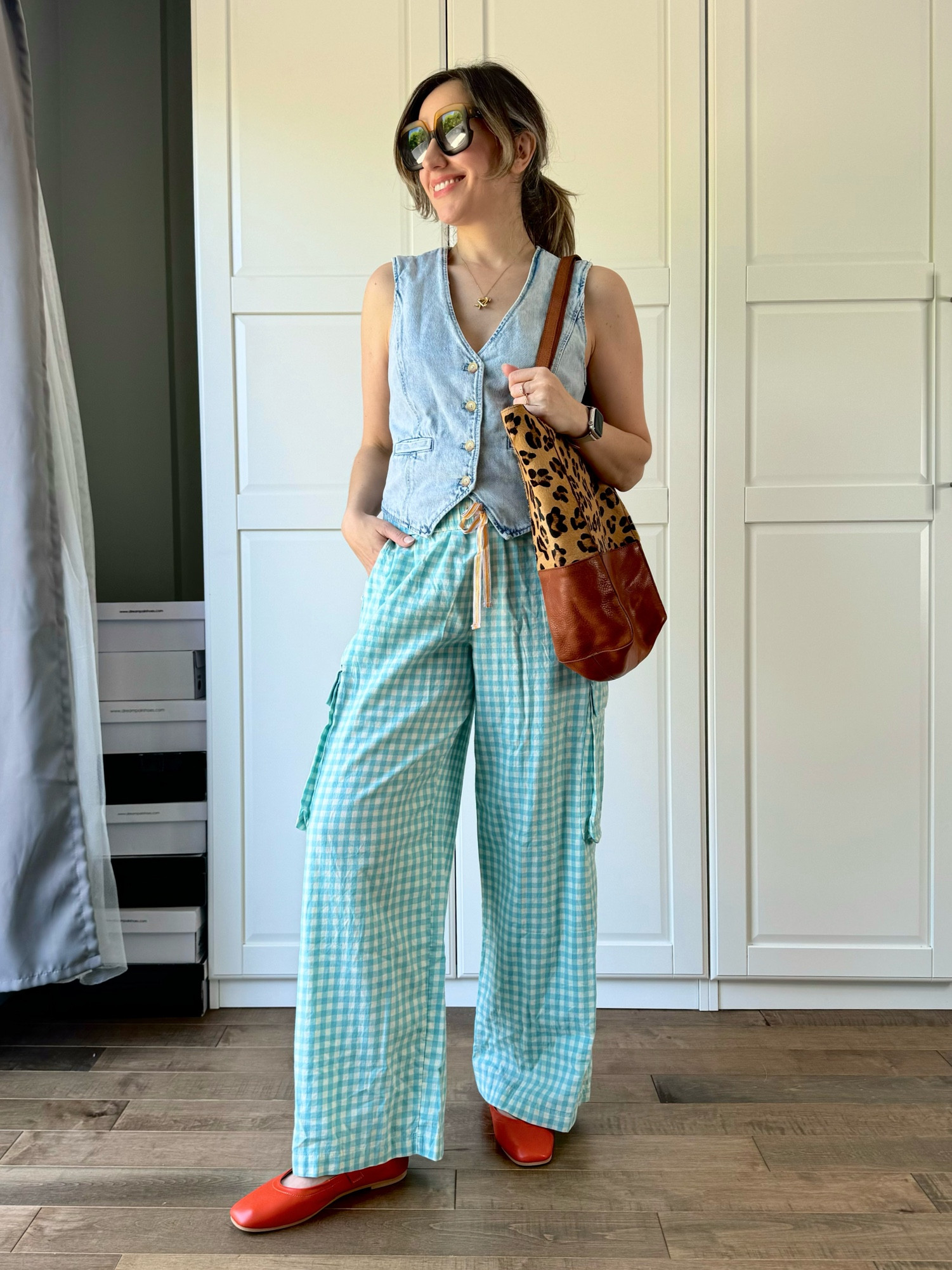 Light denim vest with turquoise gingham pj pants, orange ballerina flats and a leopard tote. 

Pajama pants, wide leg lounge pants, Mary Jane flats, ballet flats, colorful flats, colorful outfit, colorful style, colorful outfit  

#LTKOver40 #LTKFindsUnder50