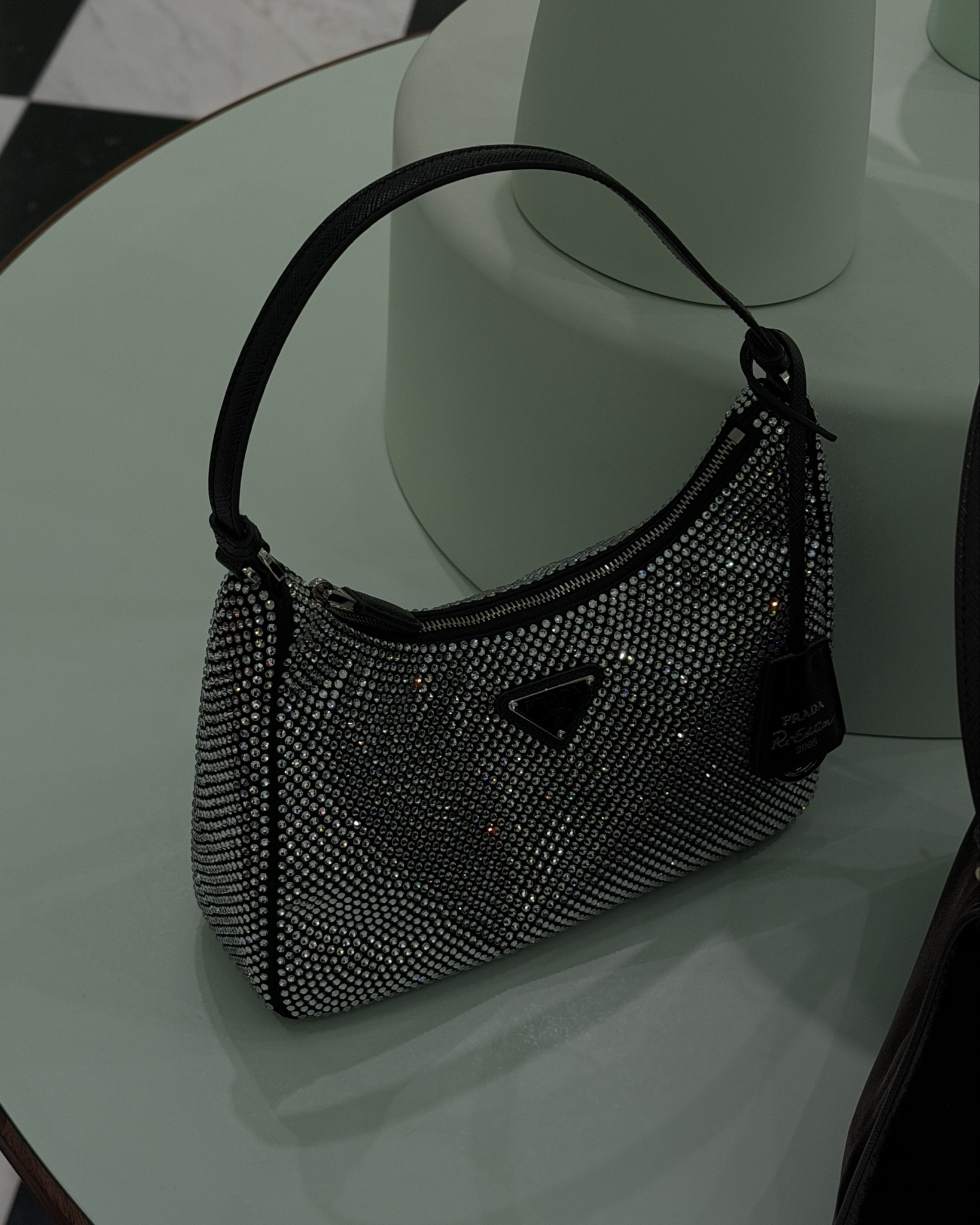 The most beautiful Prada bag there is 🤌🏼✨🖤🪩 she’s next! Sparkle Swarovski crystal prada black silver Prada handbag purse #prada #pradabag #NYE #purse #cocktailpurse #designer #handbag

#LTKootd #LTKSeasonal #LTKdayinmylife