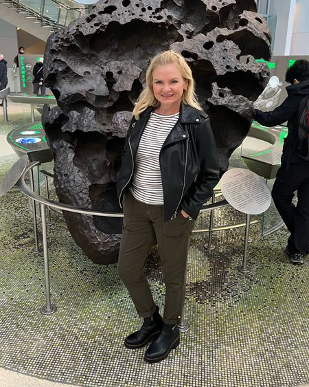 One of my outfits from our recent trip to NYC! Here I'm checking out part of a meteor at the Museum of Natural History in my #blondo boots, #whbm pants, and #walmart tee & jacket. 
Links in my Bio!
#walmartfashion
#affordablefashion
#fauxleather
#motojacket
#chelseaboots
#traveloutfit
#over50fashion
#over40fashion
#midlifeblogger
#midlifestyle
#nyc
#travel

#LTKunder100 #LTKstyletip #LTKunder50