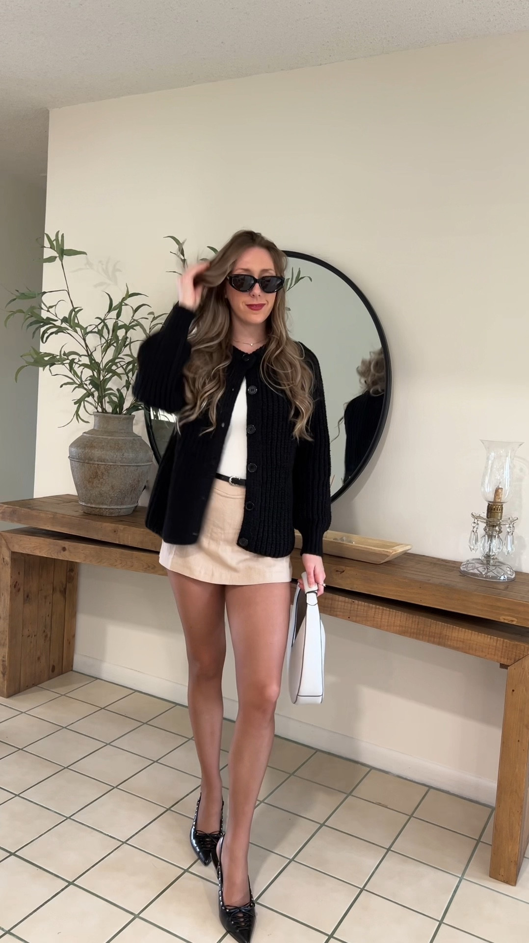 Amazon fall outfit 
Simple fall outfit 
Beige skort 
Black white and beige 
Neutral outfit 
 

#LTKFindsUnder50 #LTKSeasonal #LTKVideo