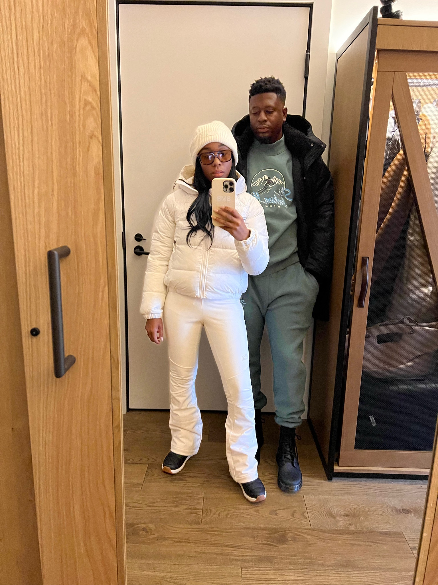 Men's coat (lightweight and keeps you warm, and Dr marten boots. I'm wearing a cream puffer jacket, ski pants, beanie, thermal snow boots, and layered with north face cozy zip up jacket 

#LTKmens #LTKtravel #LTKstyletip