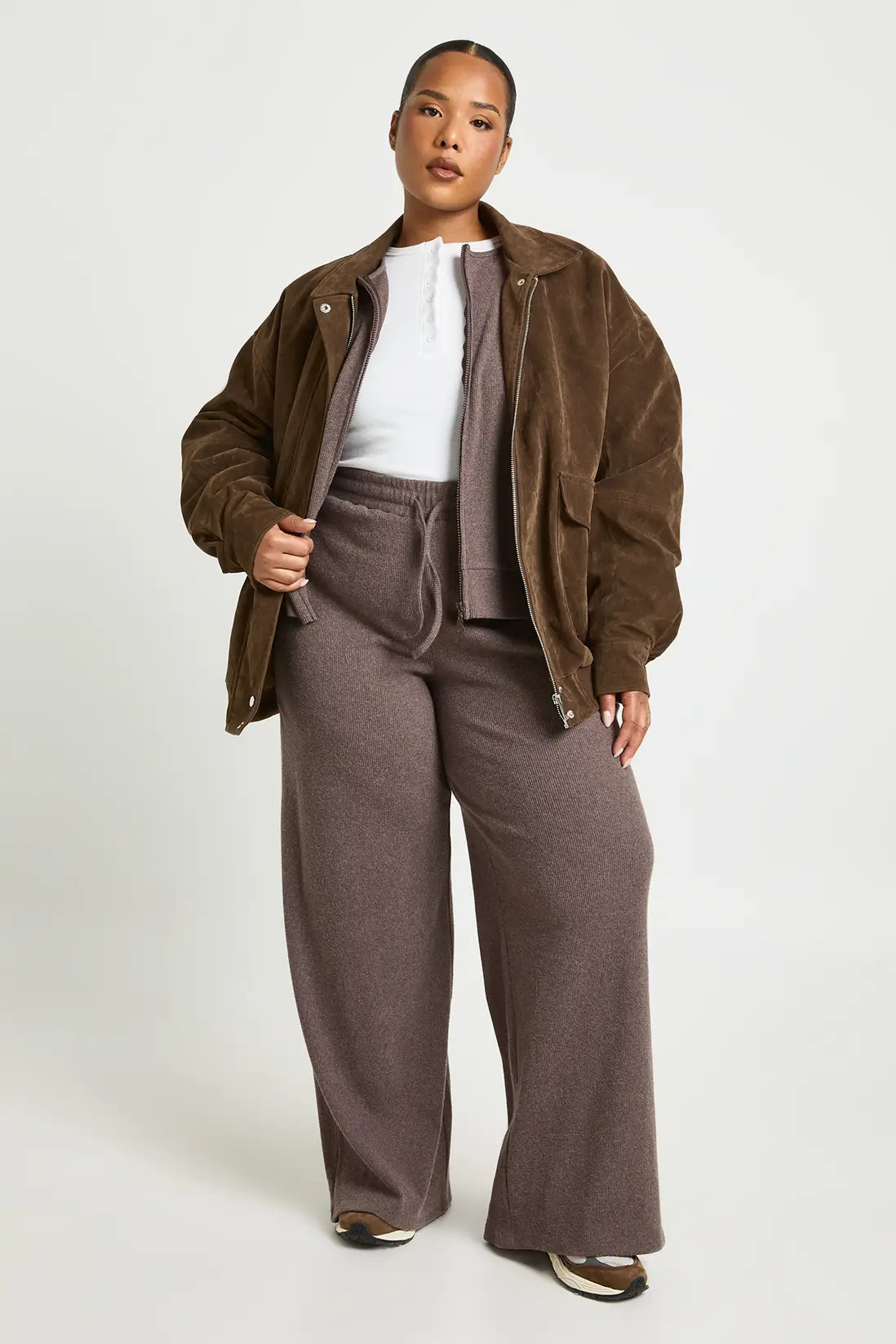 Chocolate boohoo Plus Knitted Rib Wide Leg Jogger | PrettyLittleThing AU | Pretty Little Thing (Australia & New Zealand)