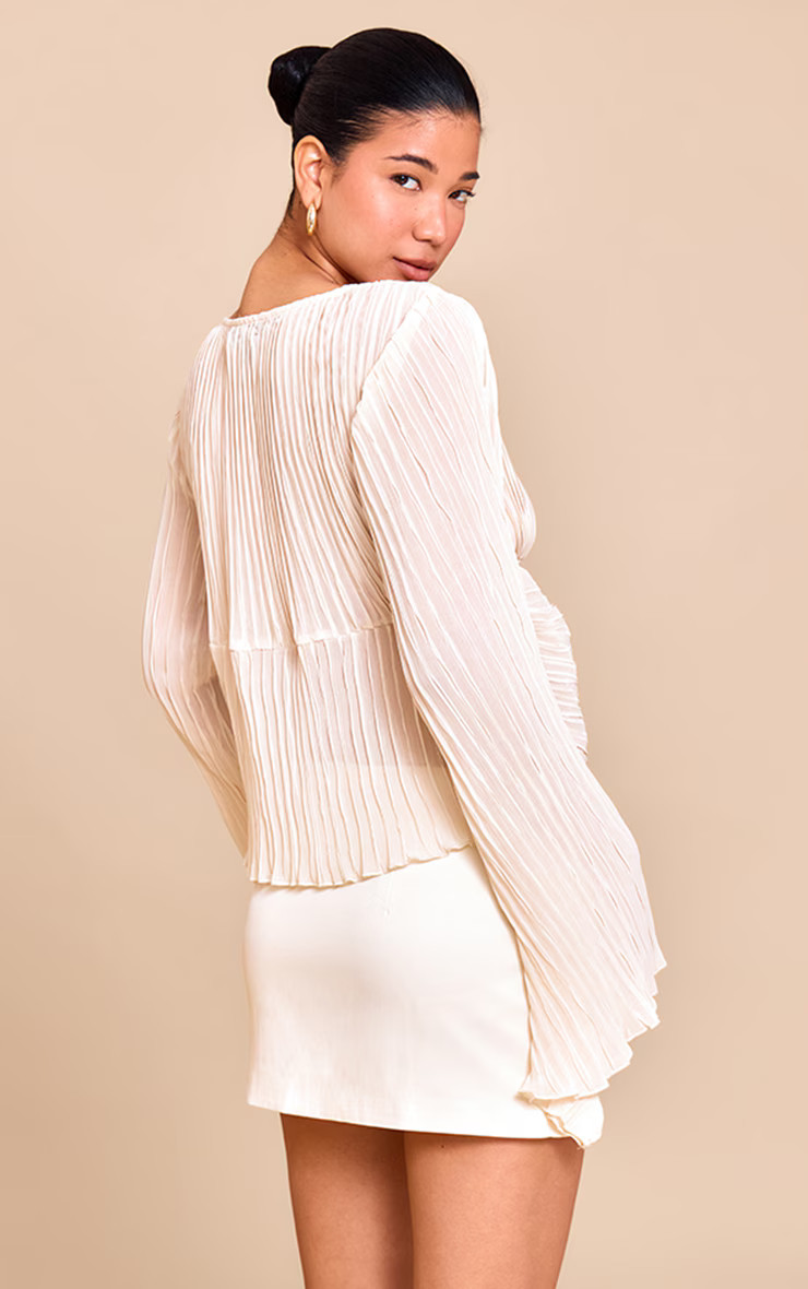 Cream Sheer Plisse Tie Front Flute Sleeve Blouse | Tops | PrettyLittleThing US